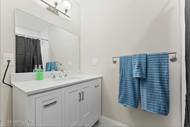 bathroom with vanity with extensive cabinet space