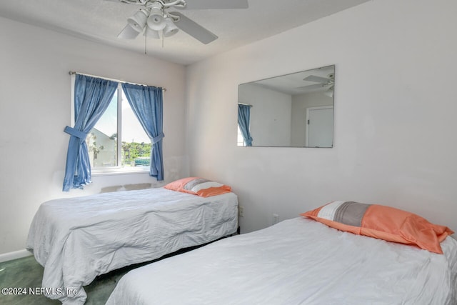 bedroom featuring ceiling fan