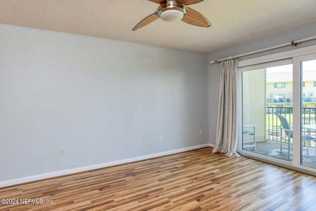 unfurnished room with light hardwood / wood-style flooring and ceiling fan