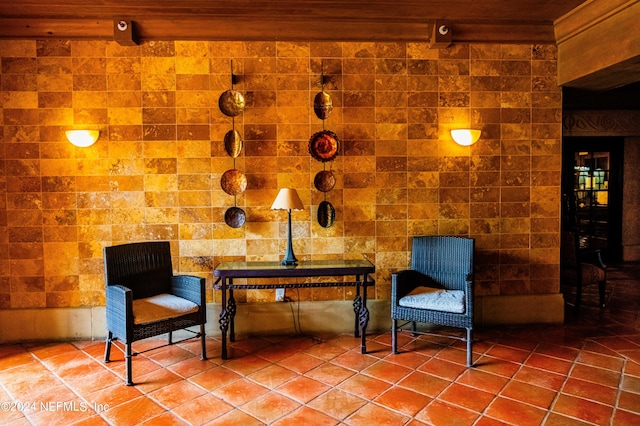 sitting room featuring tile patterned flooring