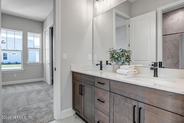 bathroom featuring vanity and plenty of natural light