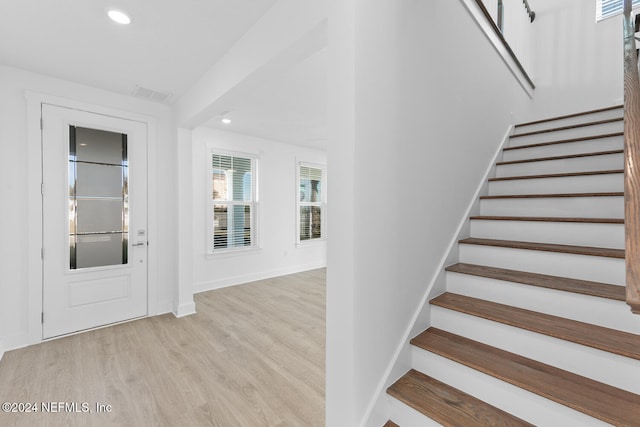 foyer entrance featuring light hardwood / wood-style flooring