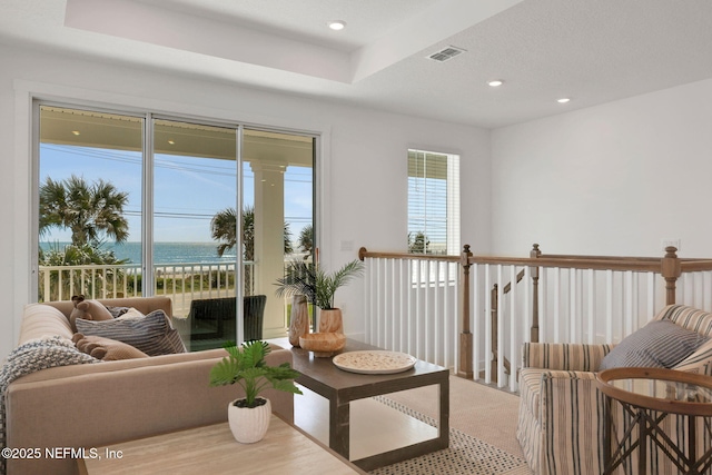 25 Seaside Vista Ct, Saint Augustine, FL 32084 - sitting room with recessed lighting, a water view, and a raised ceiling