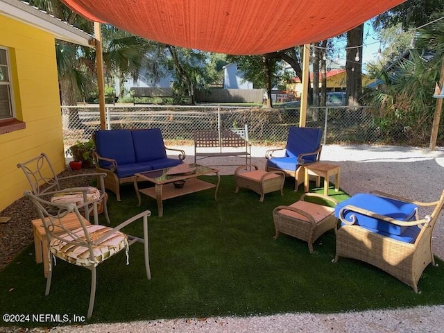 view of yard with an outdoor living space and a patio area