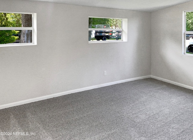 view of carpeted spare room