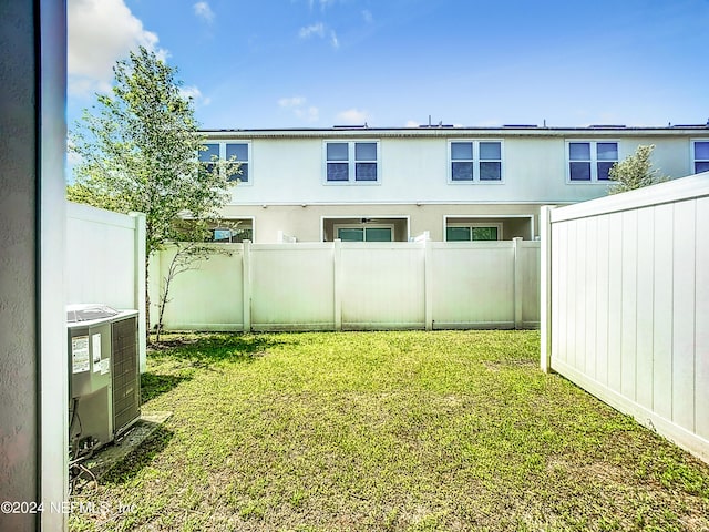 view of yard featuring central AC