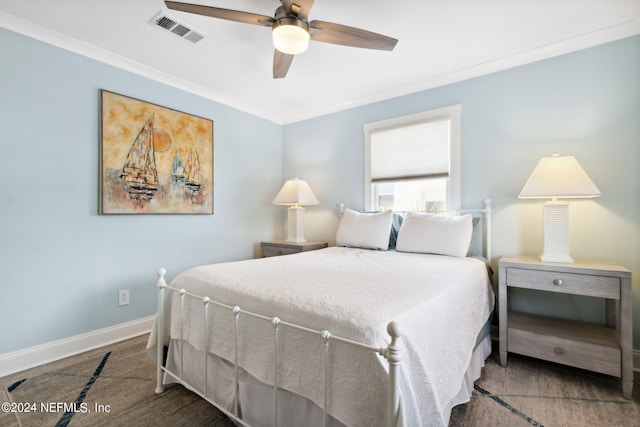 bedroom featuring ceiling fan and crown molding