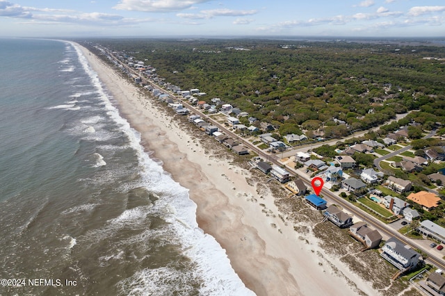 bird's eye view with a beach view and a water view