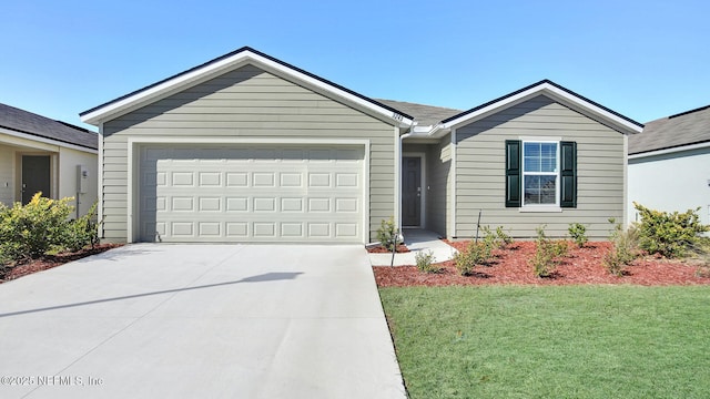 ranch-style house featuring a garage and a front lawn