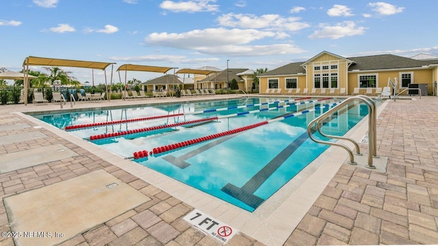 view of swimming pool featuring a patio