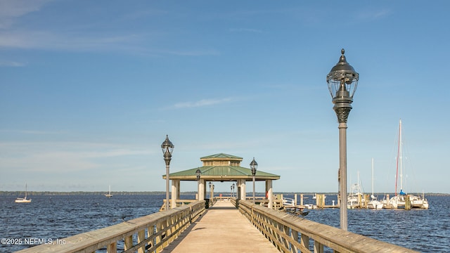 dock area featuring a gazebo and a water view