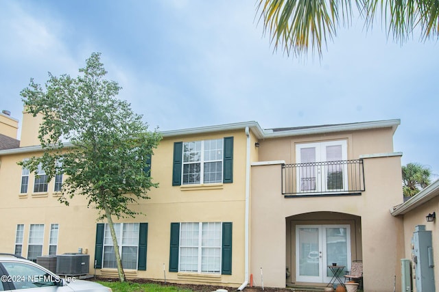 multi unit property featuring a balcony and cooling unit