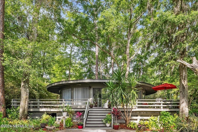 view of front of house featuring a deck