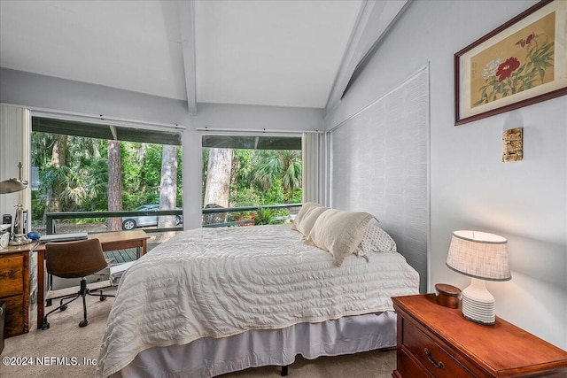 bedroom featuring vaulted ceiling with beams and carpet floors