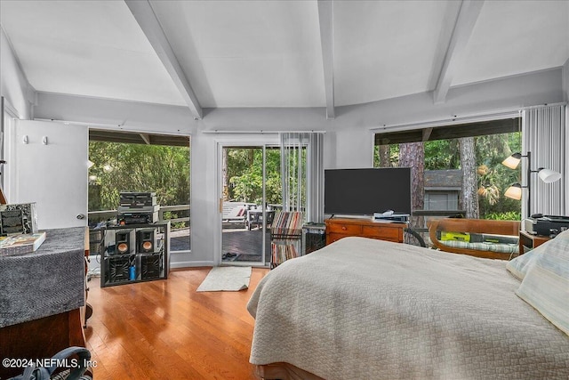 bedroom with light wood-type flooring, vaulted ceiling with beams, access to exterior, and multiple windows