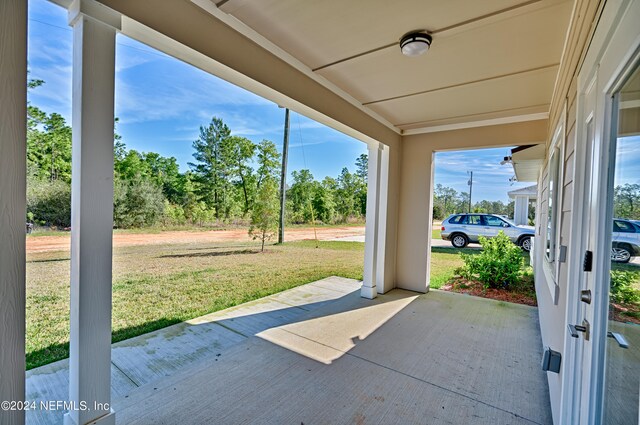 view of terrace featuring covered porch