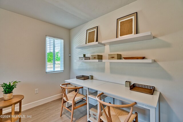 office space with light hardwood / wood-style floors