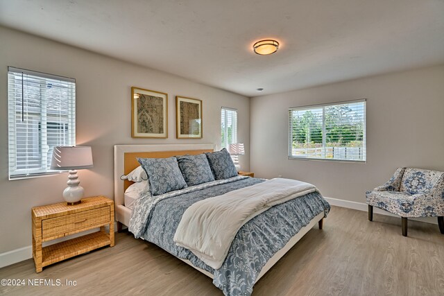 bedroom featuring light hardwood / wood-style floors