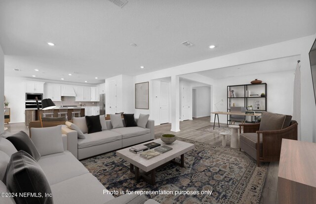 living room featuring hardwood / wood-style flooring