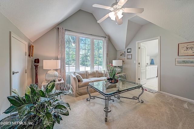 carpeted living room featuring lofted ceiling, ceiling fan, and a textured ceiling