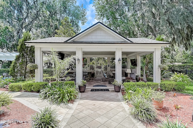 view of home's community with a patio area