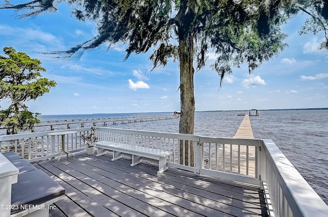 deck featuring a water view