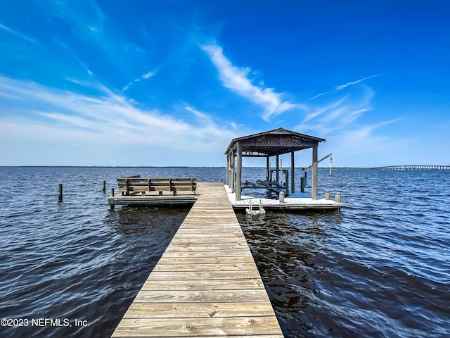 view of dock with a water view