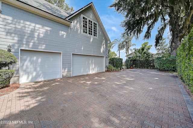 view of home's exterior with a garage