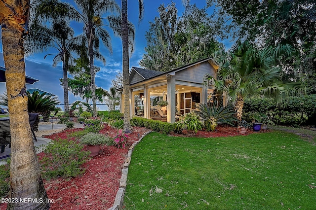 view of front of home with a front yard