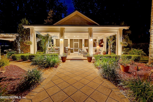 view of patio terrace at twilight