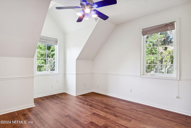 bonus room featuring lofted ceiling, ceiling fan, hardwood / wood-style flooring, and a wealth of natural light