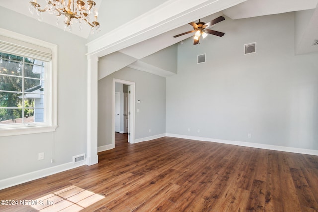 unfurnished room featuring wood-type flooring, high vaulted ceiling, and ceiling fan with notable chandelier