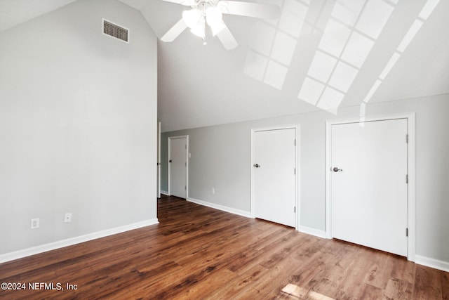 additional living space with wood-type flooring, ceiling fan, and vaulted ceiling