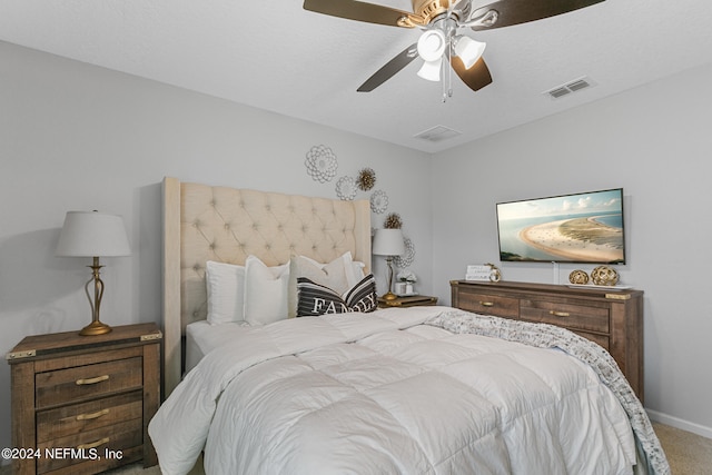 carpeted bedroom with ceiling fan