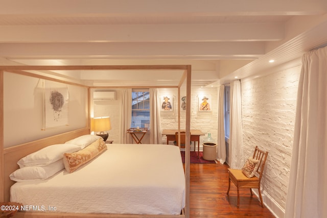 bedroom with beam ceiling, hardwood / wood-style flooring, and a wall mounted AC