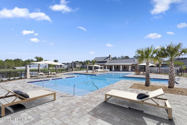 view of swimming pool with a patio area