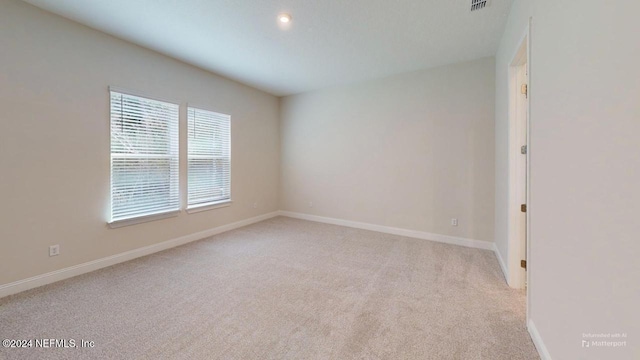 view of carpeted spare room