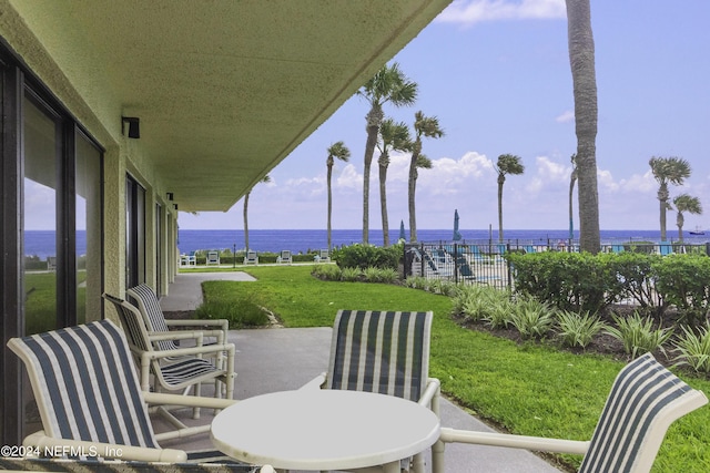 view of patio / terrace featuring a water view