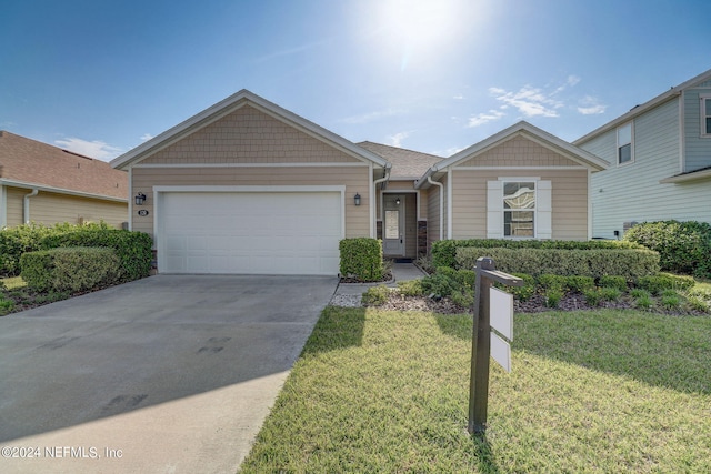 single story home with a garage and a front yard