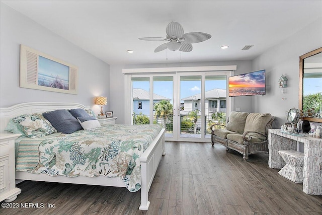 bedroom featuring dark hardwood / wood-style floors, french doors, ceiling fan, and access to outside