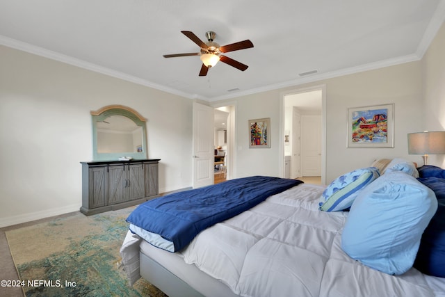 bedroom featuring ceiling fan, crown molding, and ensuite bathroom