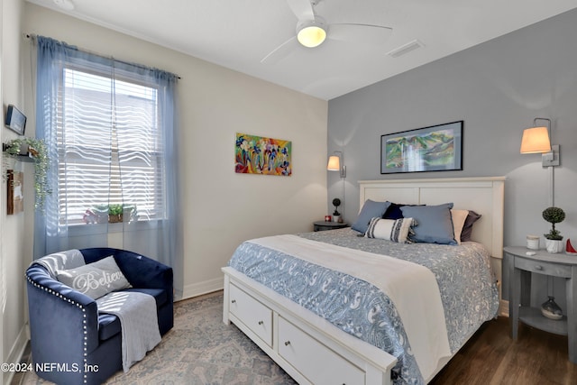 bedroom featuring ceiling fan and hardwood / wood-style flooring