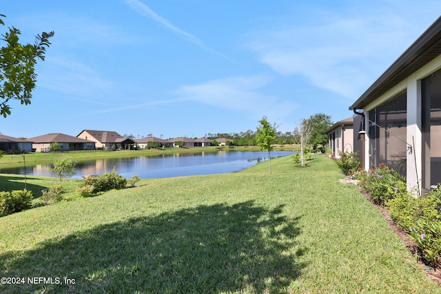 view of yard with a water view