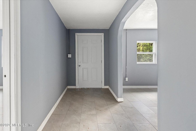 entryway featuring light tile flooring