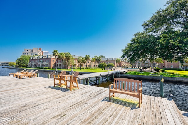 dock area featuring a water view