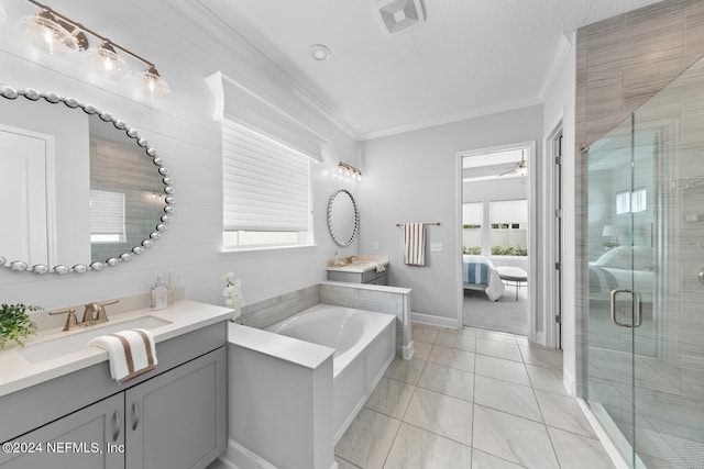 bathroom with ceiling fan, tile patterned floors, vanity, independent shower and bath, and ornamental molding