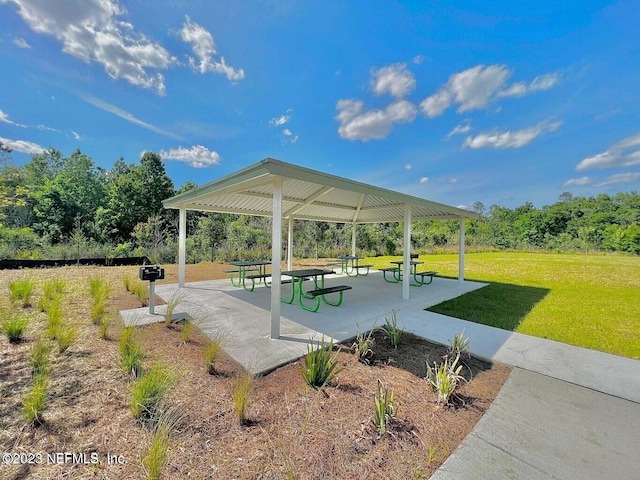 view of community featuring a yard and a gazebo