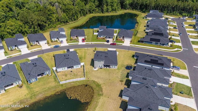 drone / aerial view featuring a water view