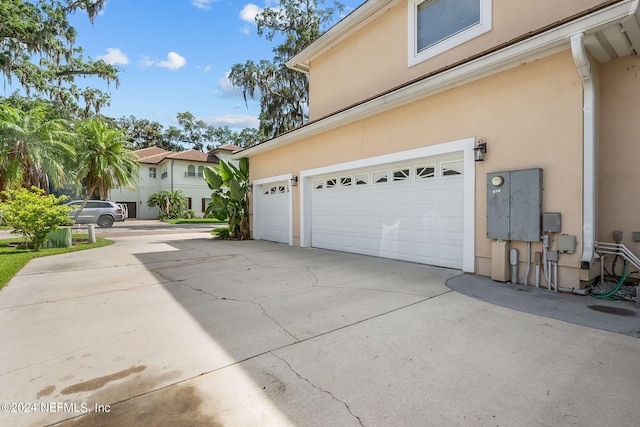 view of side of property featuring a garage