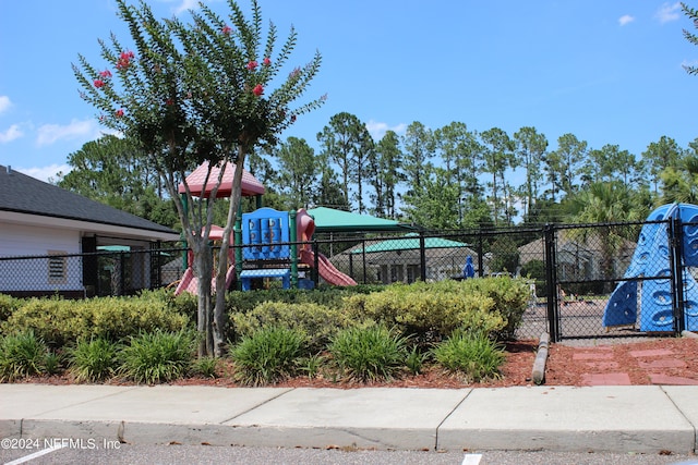 community play area featuring fence